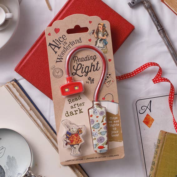 Alice in Wonderland themed reading light in decorative packaging