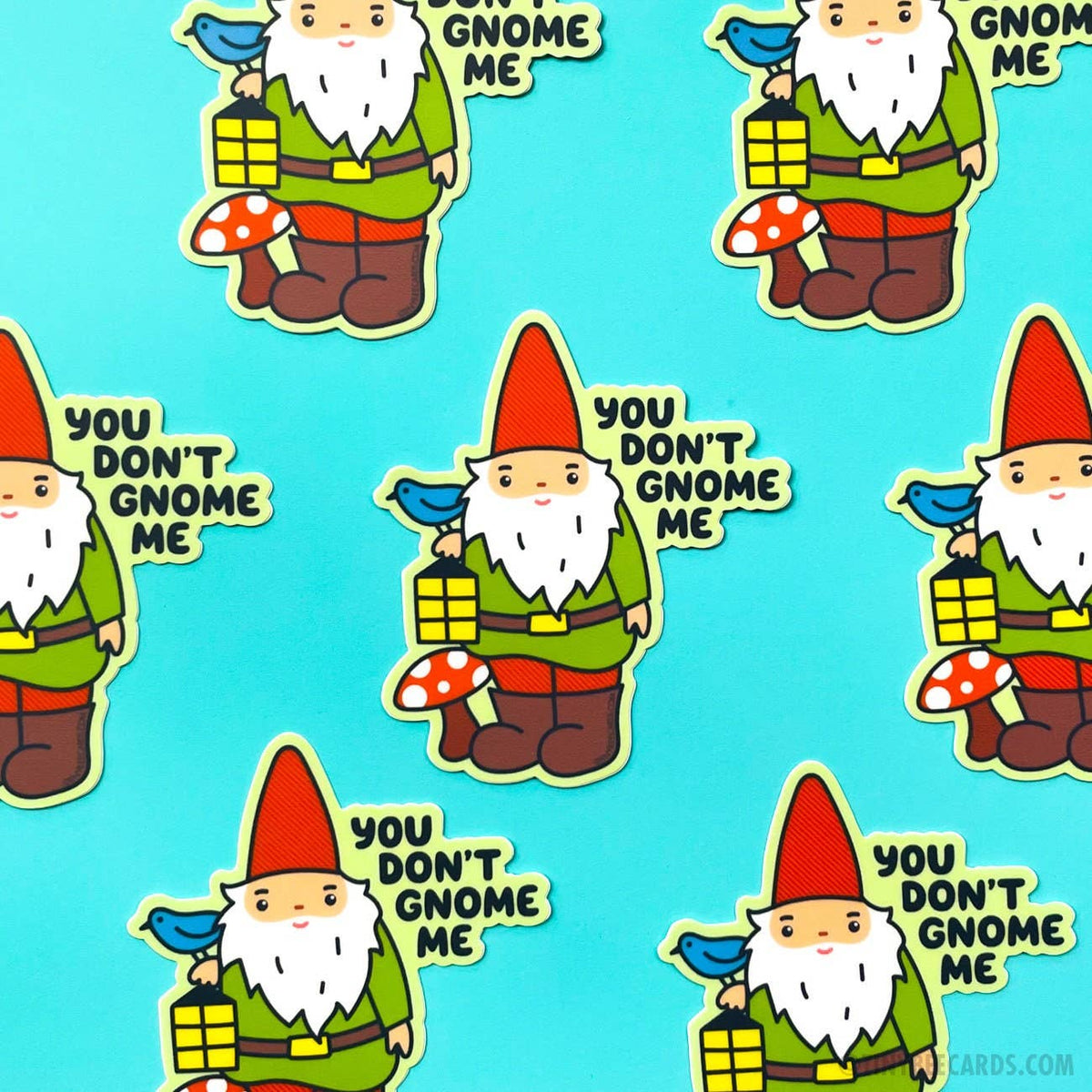 Pattern of cartoon gnomes with text 'YOU DON'T GNOME ME' on a blue background
