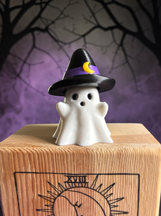 3D printed ghost clicker fidget wearing black witch hat with purple band and crescent moon