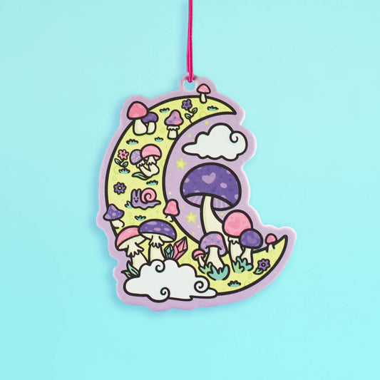 Crescent moon car air freshener decorated with colorful mushrooms and flowers