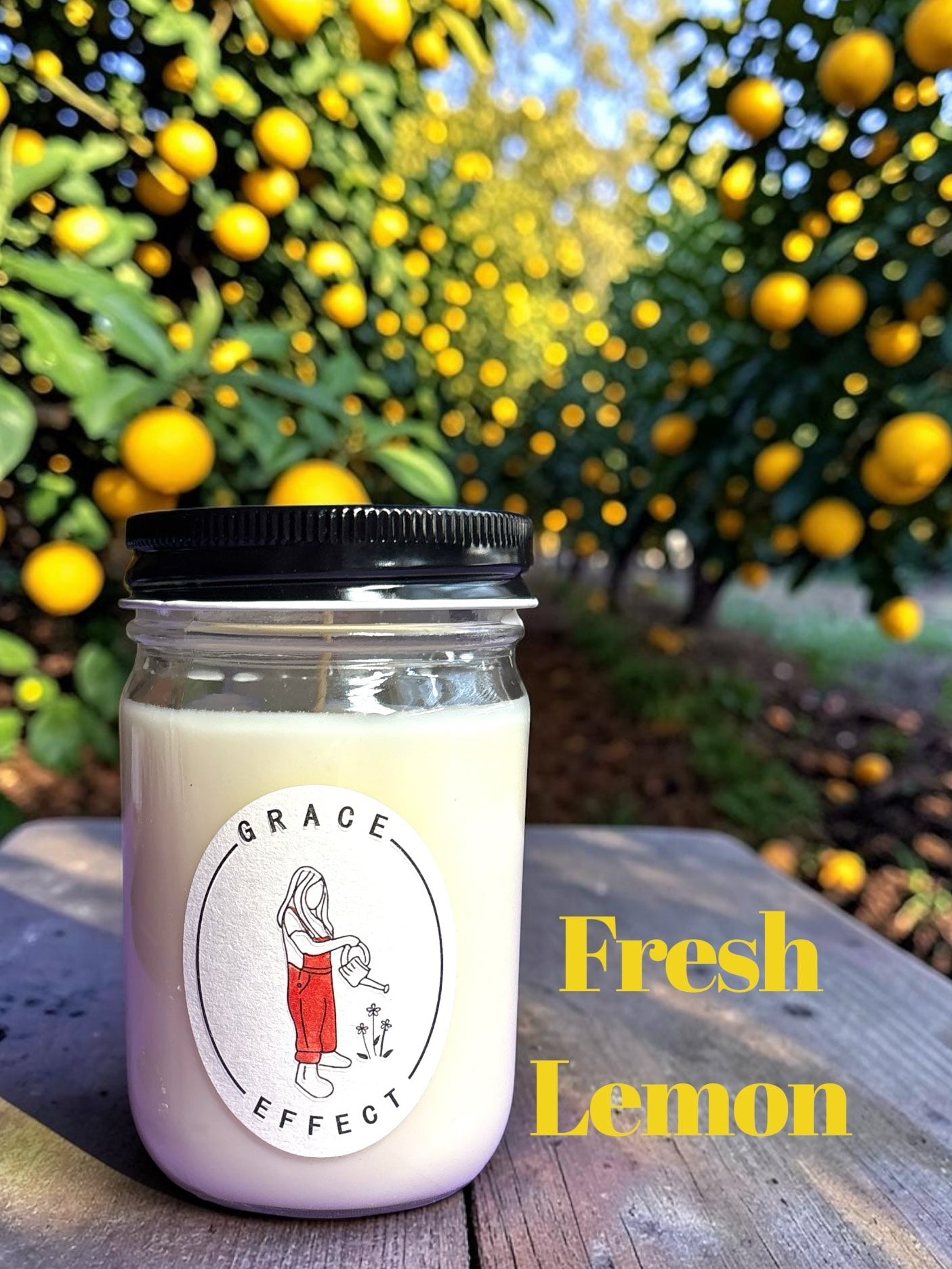 Whimsy and Woo Grace Effect soy wax candle in a glass mason jar with a lemon grove background.